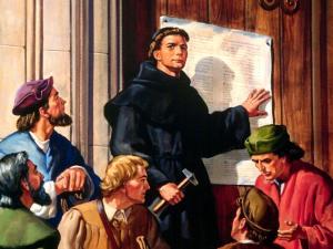 Лютер прибивает 95 тезисов на двери церкви